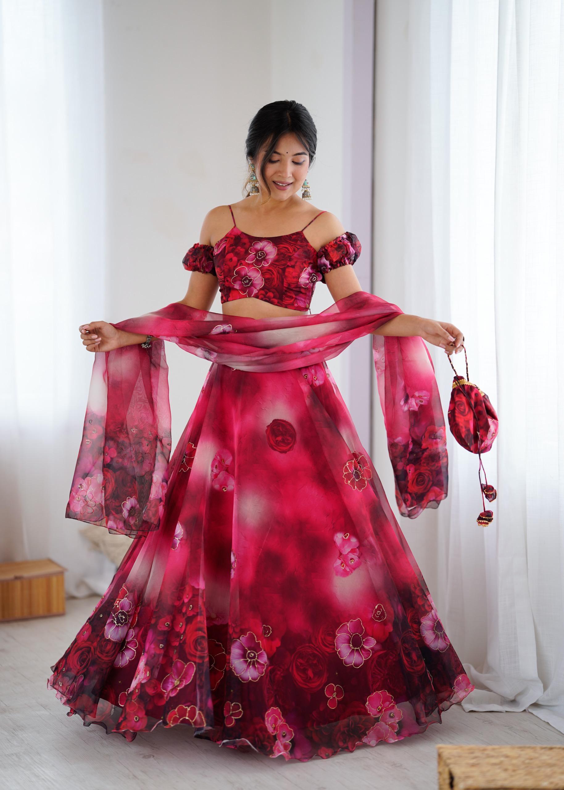 Exclusive Organza Digital Print Lehenga Set with Batwa Bag Exclusive Organza Digital Print Lehenga Set with Batwa Bag