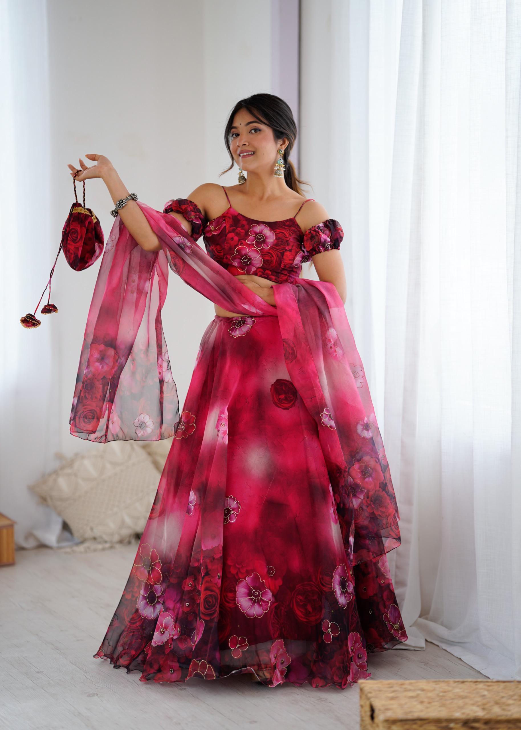 Exclusive Organza Digital Print Lehenga Set with Batwa Bag Exclusive Organza Digital Print Lehenga Set with Batwa Bag