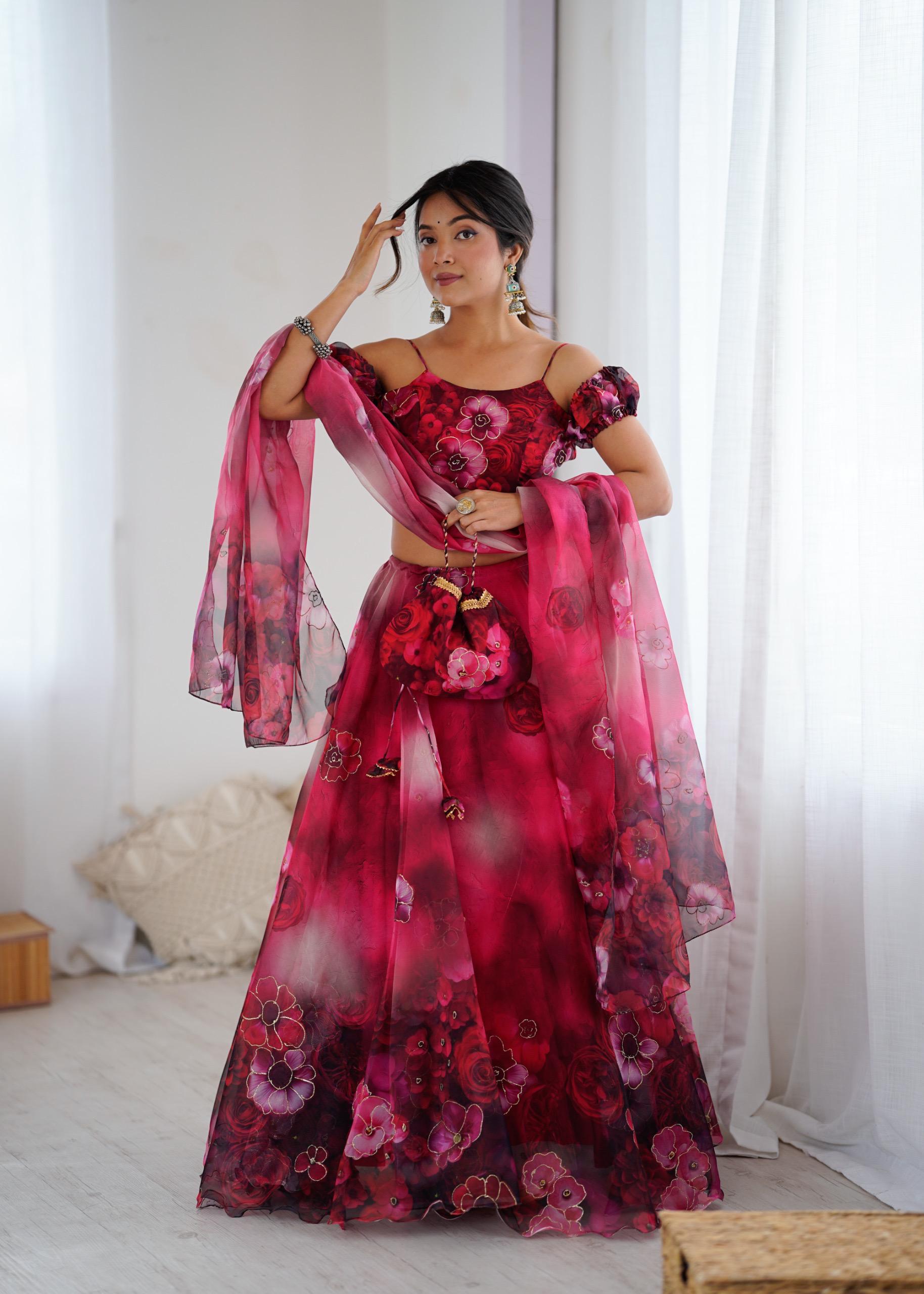 Exclusive Organza Digital Print Lehenga Set with Batwa Bag Exclusive Organza Digital Print Lehenga Set with Batwa Bag