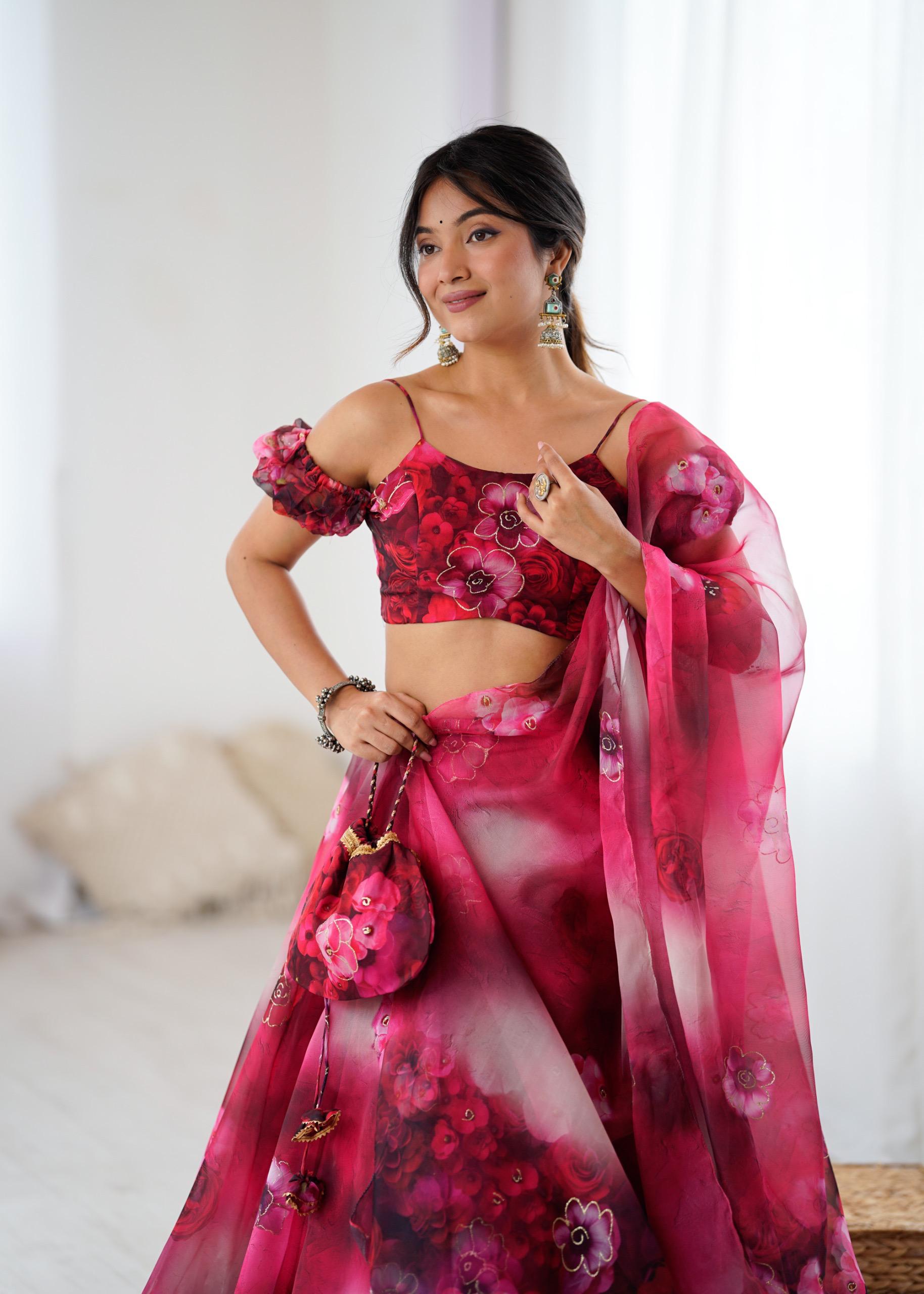 Exclusive Organza Digital Print Lehenga Set with Batwa Bag Exclusive Organza Digital Print Lehenga Set with Batwa Bag