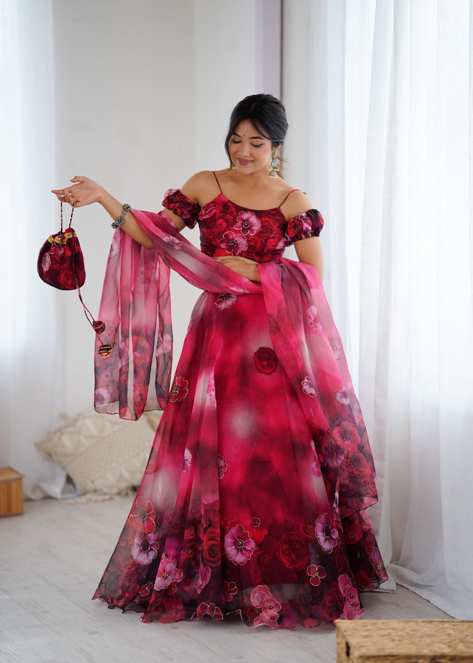 Exclusive Organza Digital Print Lehenga Set with Batwa Bag Exclusive Organza Digital Print Lehenga Set with Batwa Bag