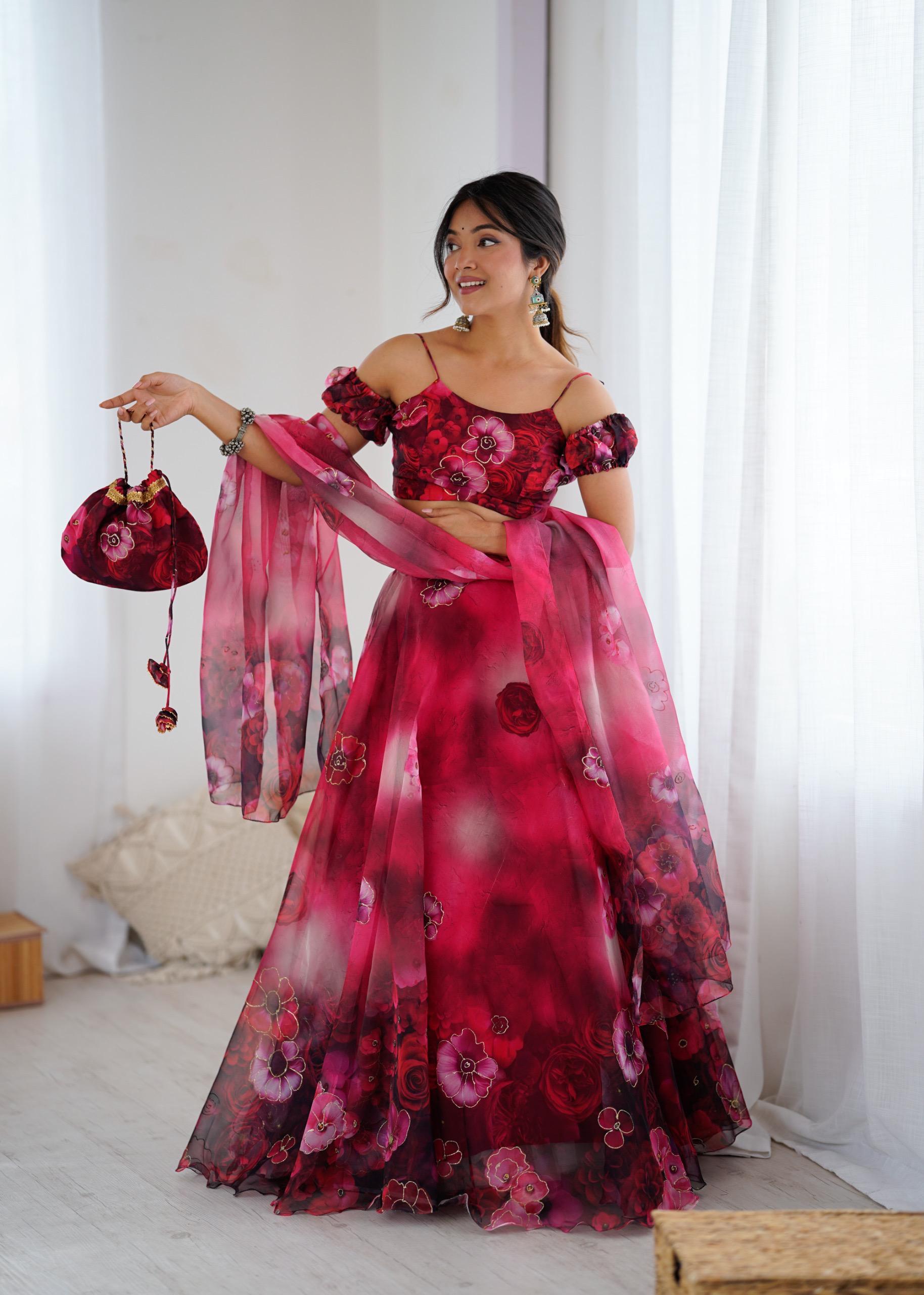 Exclusive Organza Digital Print Lehenga Set with Batwa Bag Exclusive Organza Digital Print Lehenga Set with Batwa Bag